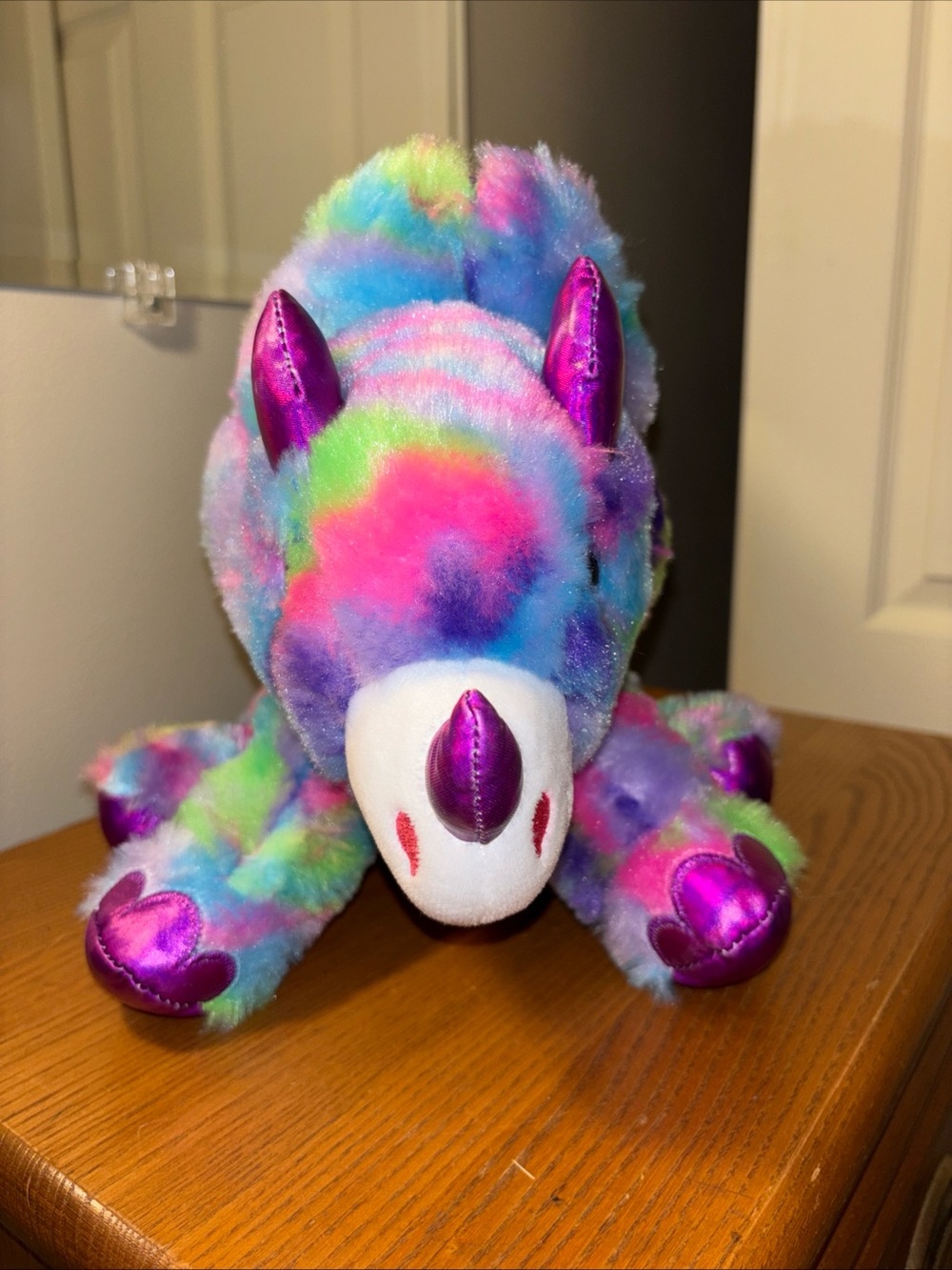 Fiesta Multicolor Tie-Dye triceratops Plush with Metallic Purple Accents